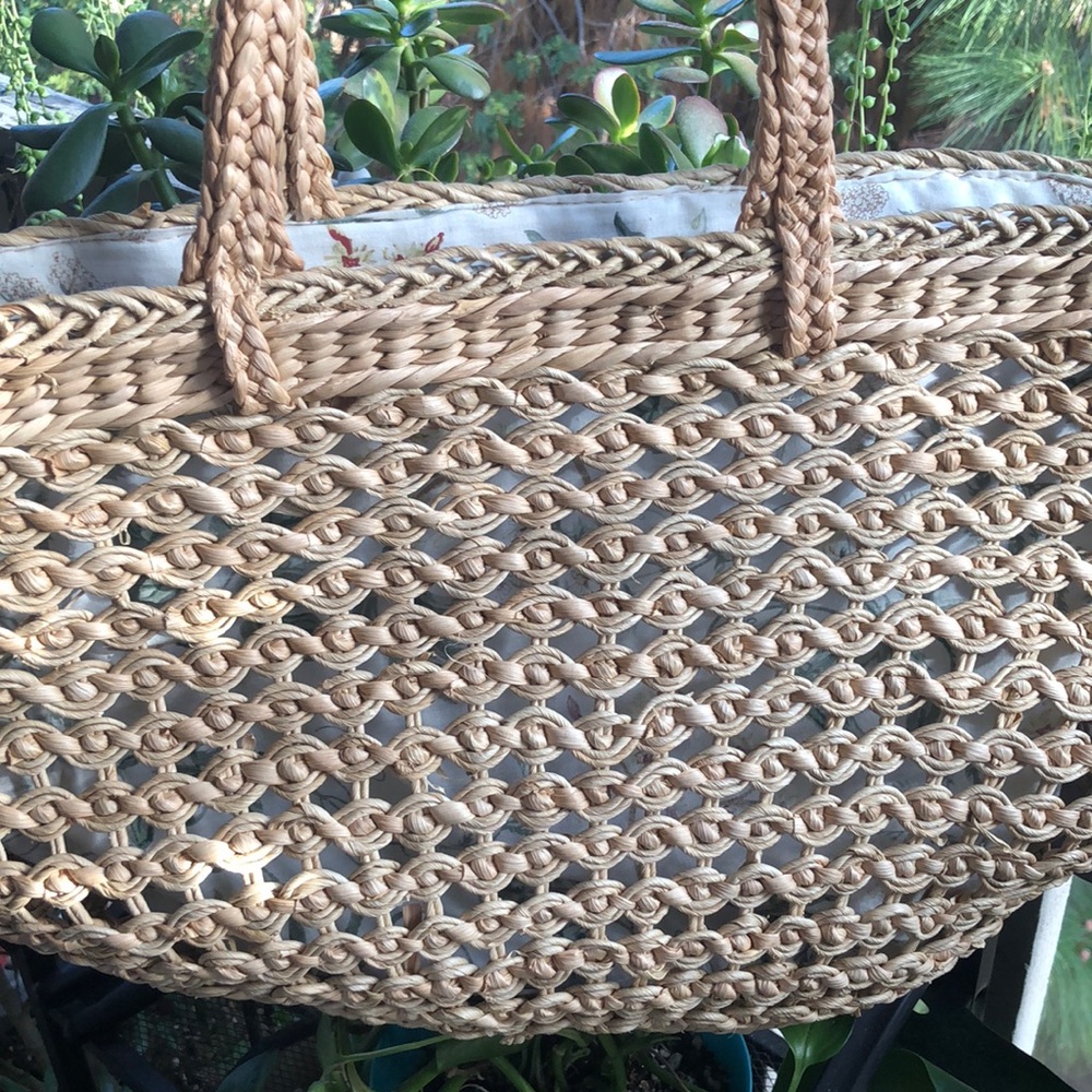 Tiffany & Co. raffia/straw beach bag. Floral lining with inner pocket